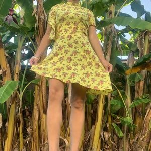 Cute yellow floral dress with exposed back!